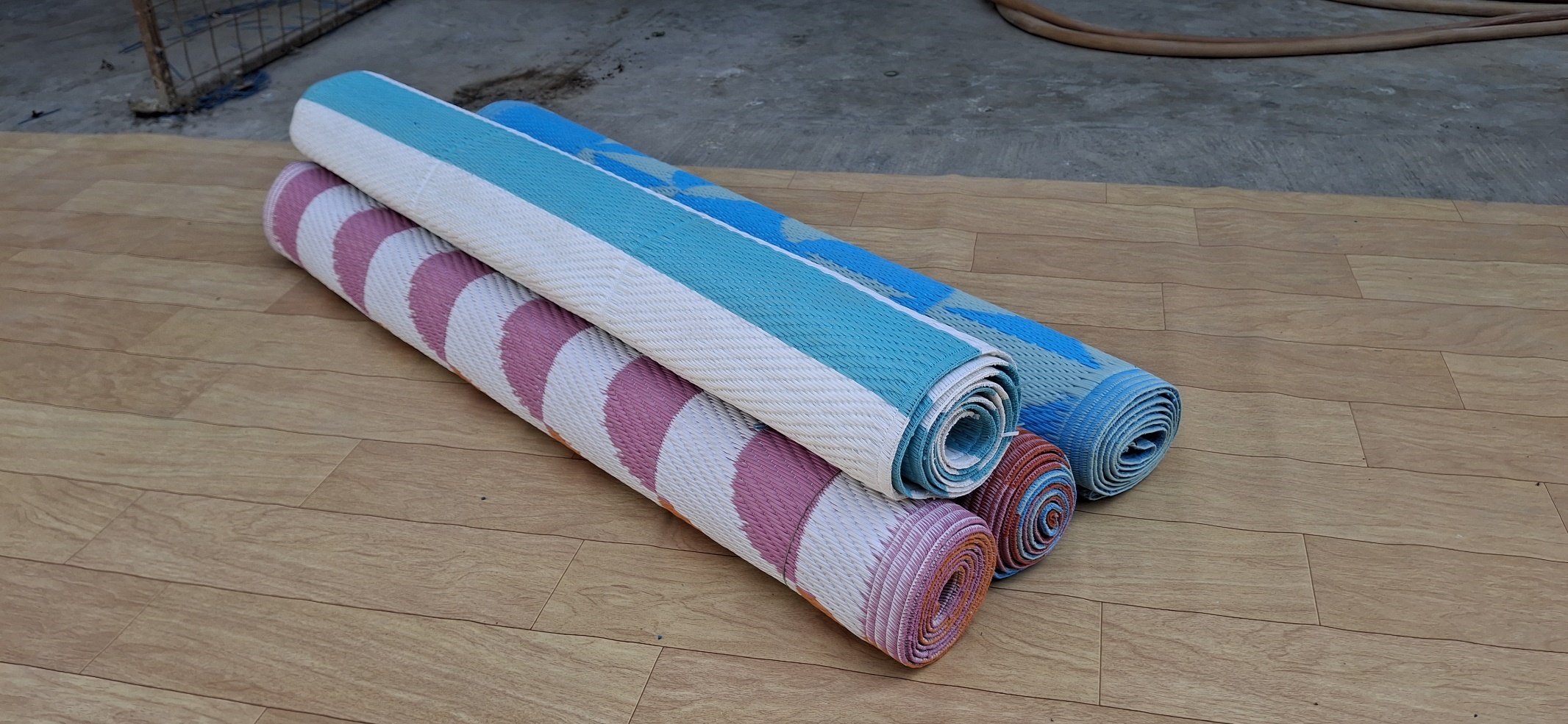 Weather-resistant polymer mat for balcony and deck by Kisna Exia Group